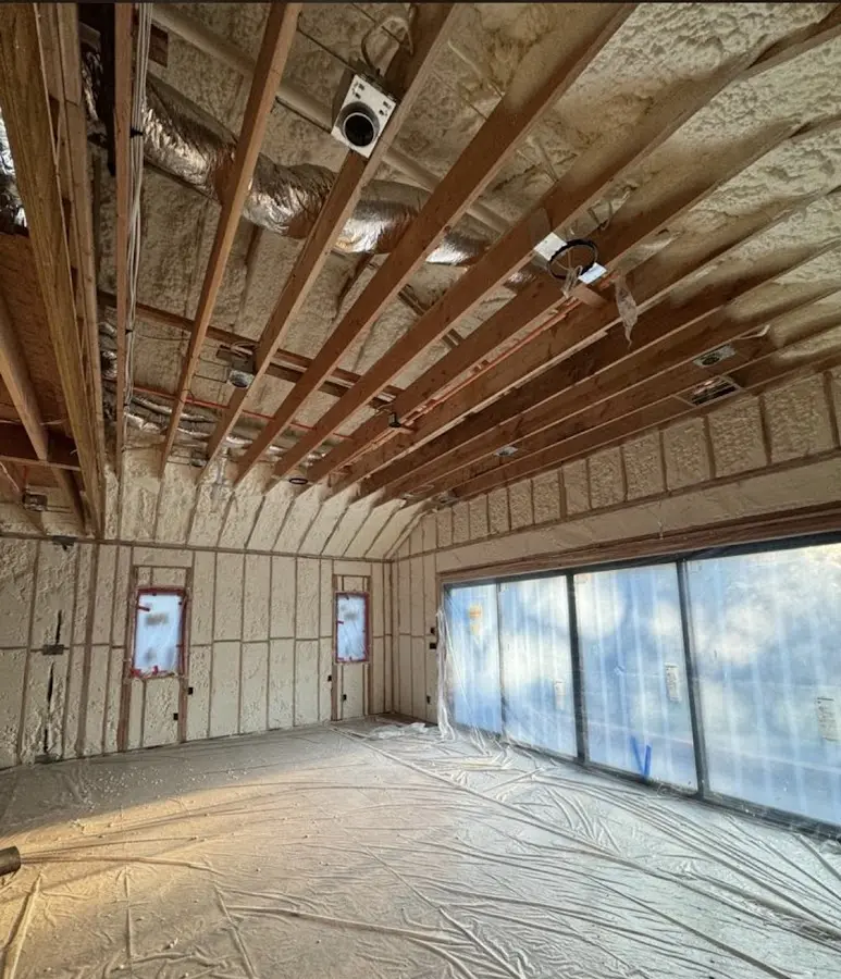 Interior walls and ceiling insulated with spray foam during new construction in Lake City